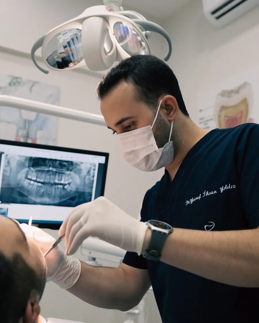 Dentist performing a restorative procedure
