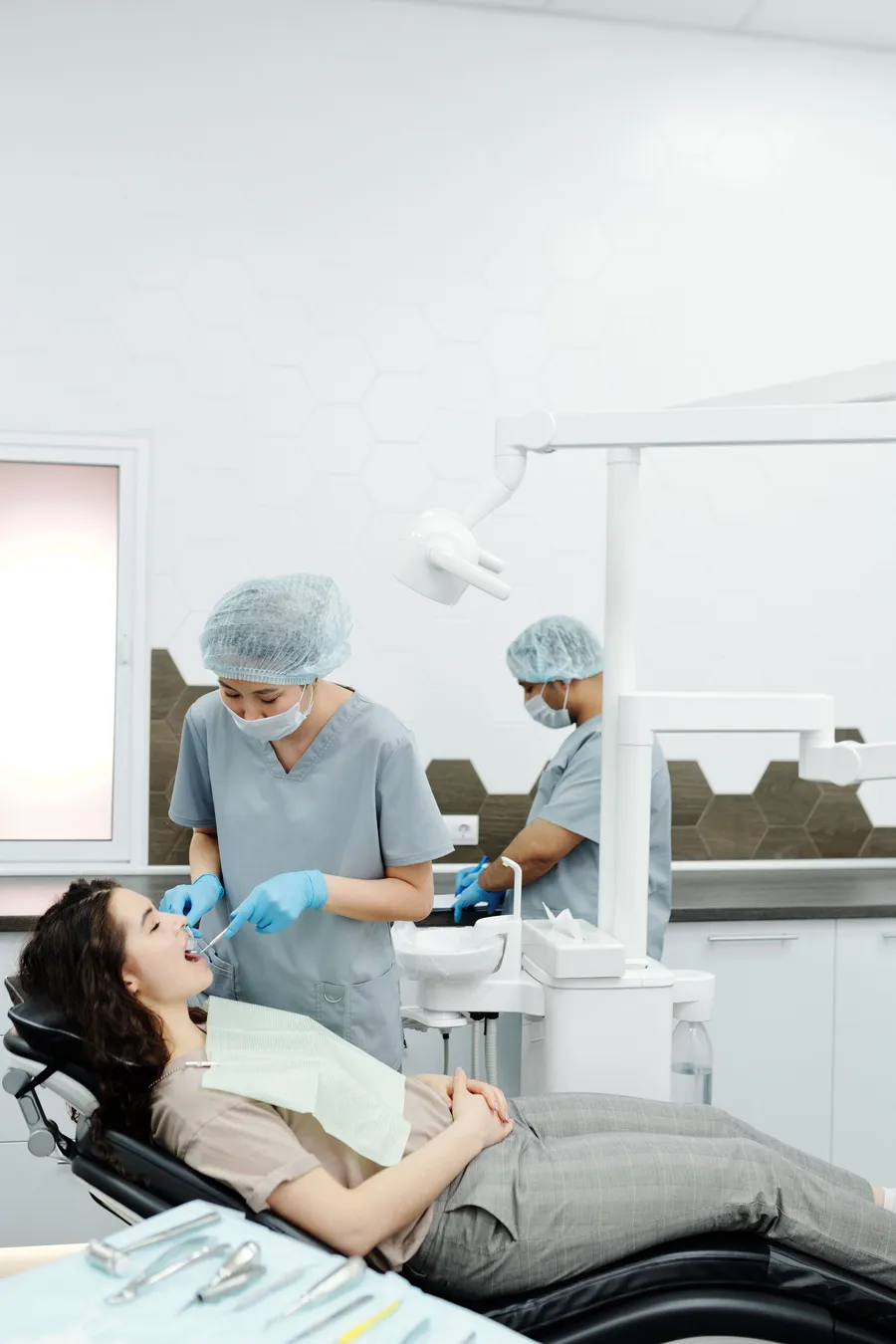Dental team reviewing a patient’s exam